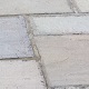 This existing Indian Sandstone patio has been cleaned, loose paving stones re-bedded and the whole terrace repointed. If your paving needs attention call us now: (01590) 636573