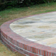 Eastern Limestone natural paving with Ashdown Bexhill Red handmade Brick Edge.