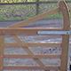  Installation of a 3m wide, 44 tonne load capactity Trackway Cattle Grid with sediment catchment pit in-front. Oak hand rail and gate posts, with 2.3m Iroko Estate gate, fitted with automation.